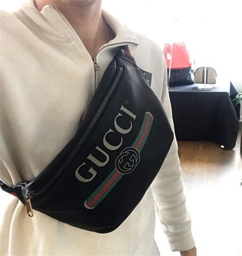 gucci men's retro logo belt bag fanny pack|Medium GG belt bag in grey and black GG leather .